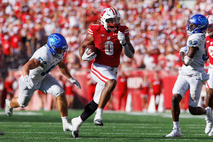 Sep 2, 2023; Madison, Wisconsin, USA; Wisconsin Badgers running back Braelon Allen (0) rushes with the football during the third quarter against the Buffalo Bulls at Camp Randall Stadium. Mandatory Credit: Jeff Hanisch-USA TODAY Sports